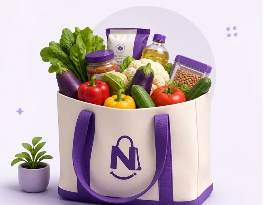 Nearle grocery bag filled with vegetables and packaged products
